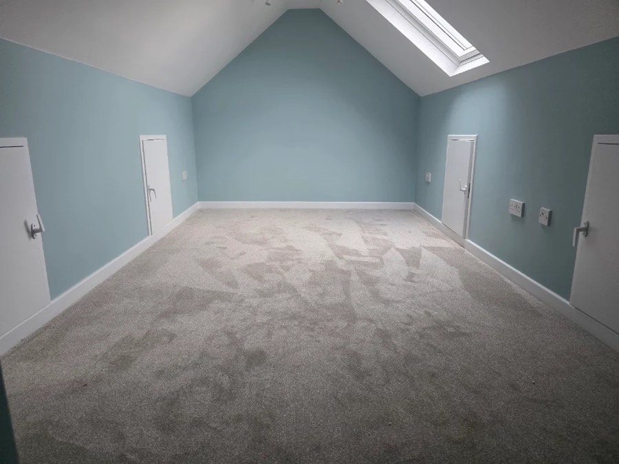 A & R Flooring job — new carpet fitted in an attic bedroom