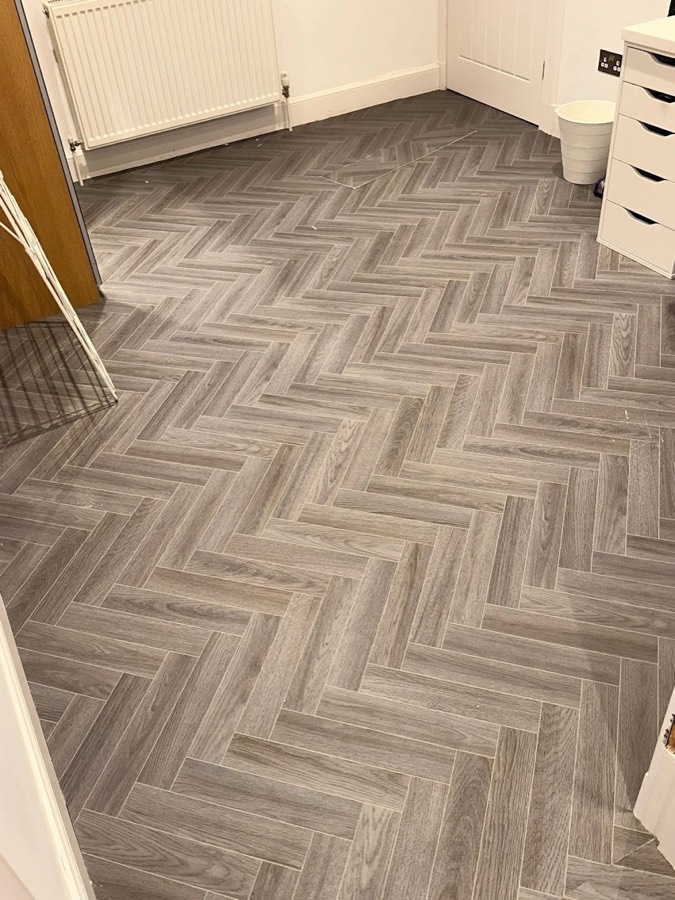 Grey herringbone LVT fitted by A & R Flooring